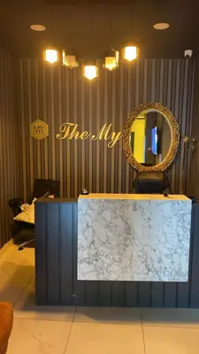a mirror and a counter with a marble counter top at The my hotel darica in Darıca
