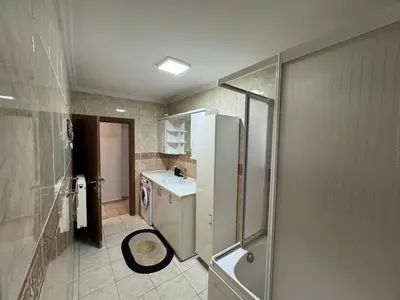 a bathroom with a shower and a sink and a toilet at شقه الأحلام بمنطقة شيشلى ثلاث غرف وصالون in Istanbul