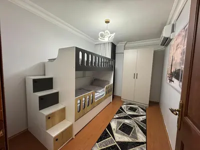 a bedroom with a bunk bed in a room at Luxurious apartment in Sisli area, three rooms and a living room in Istanbul