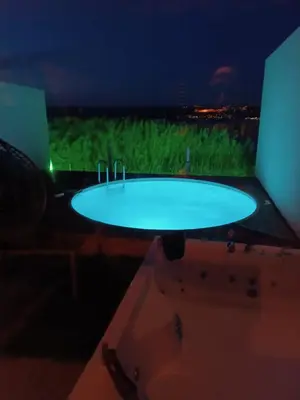 a large tub in a room with a view at Flamingo aura in Sapanca