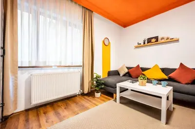 a living room with a couch and a table at Galata Hidden Apartments in Istanbul