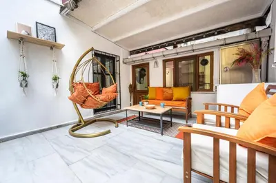 a living room with a couch and a table at Galata Hidden Apartments in Istanbul