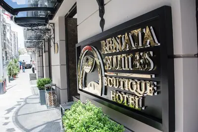 a sign for a restaurant on the side of a building at Renata Boutique Hotel Sisli in Istanbul