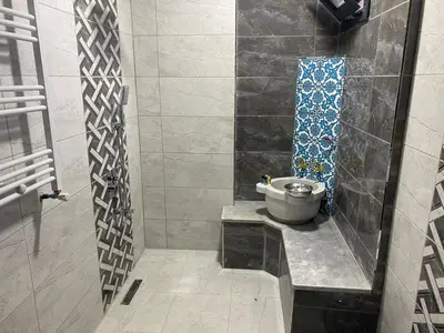 a bathroom with a shower with a toilet in it at Ağva Capella Hideaway Hotel in Sile
