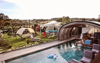 a swimming pool with a toy dolphin in the water at villa SM in Çatalca