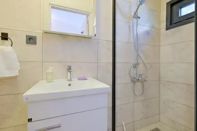 a bathroom with a sink and a shower at Casa Nozze 3 in Istanbul