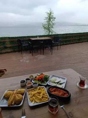a table with a tray of food on top of a table at Flamingo Adalife in Sapanca