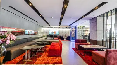 a lobby with a couch and chairs and a table at Kent Hotel Beyazıt in Istanbul
