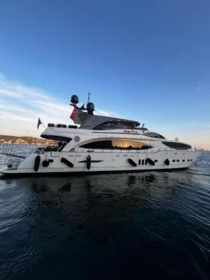 a white yacht in the water on the ocean at Den Den İstanbul in Istanbul