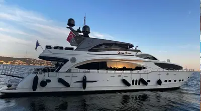 a large white yacht in the water at Den Den İstanbul in Istanbul