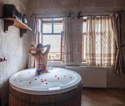a mannequin in a bath tub in a room at Zenith Göreme in Istanbul
