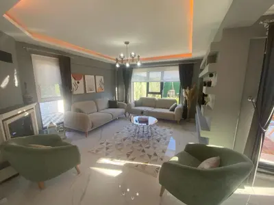 a living room with couches and chairs and a table at Lina Garden Villa in Sapanca