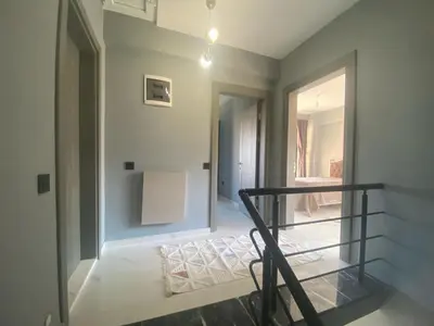 a staircase in a room with a stair case at Lina Garden Villa in Sapanca