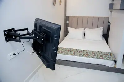 a bedroom with a tv and a bed in a room at Dream Flat in Istanbul