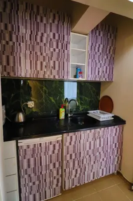 a kitchen with a sink and a counter top at Stone Home Apart in Istanbul
