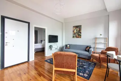 a living room with a couch and a table at Historic 4BR 4BA Mansion Seaview Yedikule Old Town in Istanbul