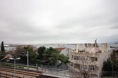 a view of a city with a train tracks and a building at Historic 4BR 4BA Mansion Seaview Yedikule Old Town in Istanbul