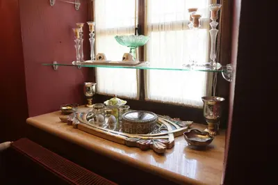 a window sill with a table with glass items on it at Aslibey Konaği - Adults Only in Sapanca