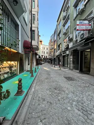 an empty street with green paint on the sidewalk at Viva Sirkeci Butik Hotel in Istanbul