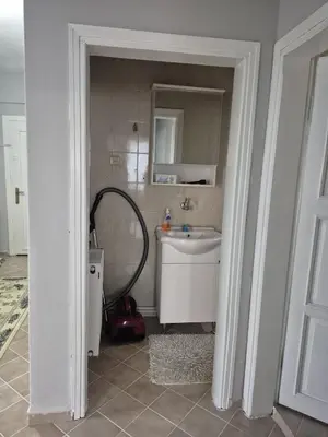 a bathroom with a sink and a mirror at Bosphorus view apartment Sarıyer in Sarıyer