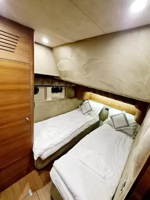 two twin beds in a small room with at Den Den İstanbul in Istanbul