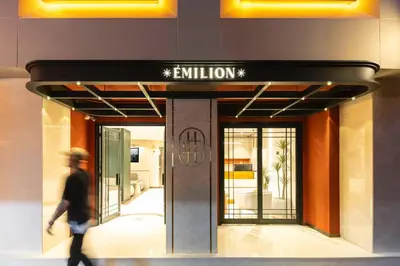 a man walks past an entrance to a building at Emilion Hotel in Istanbul