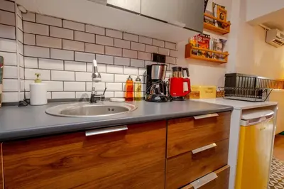 a kitchen with a sink and a counter top at Studio Apartment in Istanbul