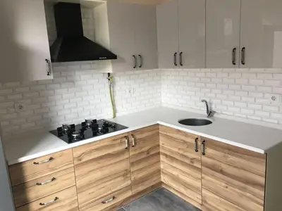 a kitchen with a sink and a stove in it at STS Hotel Luleburgaz in Lüleburgaz