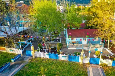 an aerial view of a playground with a blue fence at Devrim Apart in Ocaklar