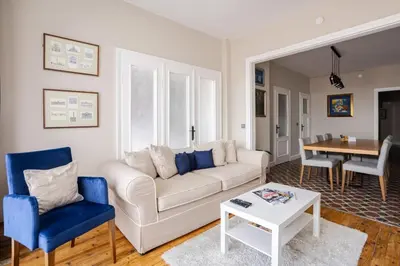 a living room with a couch and a table at Elegant 3BD Bosphorus Views Chic Kadıkoy Home #384 in Istanbul