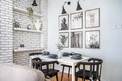 a dining room with a white table and chairs at Stay Beyond the Bosphorus #4 in Istanbul