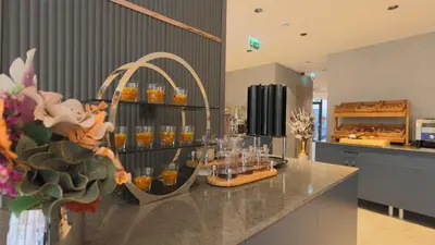 a kitchen with a counter with glasses on it at The Galata Glory Hotel in Istanbul