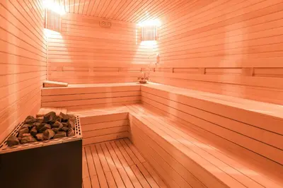 a sauna with wooden walls and a wooden floor at Sia Hotel Thermal & Spa in Nilüfer