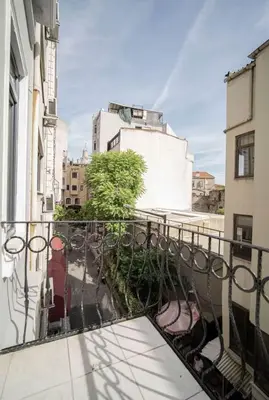 a balcony with a view of a building at House with balcony in Galata 2 in Istanbul
