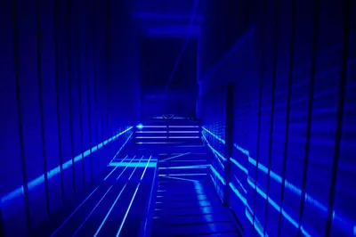 a blue corridor with stairs in a building at Andalus Villas Lake View NO ALCOHOL ALLOWED with Heated Pool in Sakarya