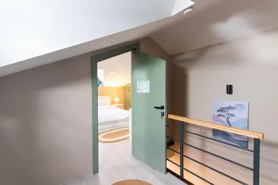 a room with a staircase leading to a bedroom at Göktürk's Finest 2BR Stylish, Spacious & Prime in Kemerburgaz