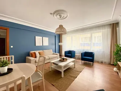 a living room with a couch and a table at City Center 3 Bedroom Flat - No4 in Istanbul