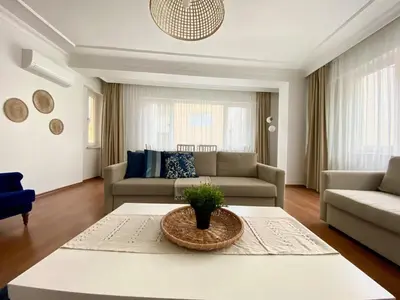 a living room with a couch and a table at Central & Spacious Flat - No5 in Istanbul