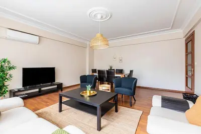 a living room with a couch and a table at Gorgeous 3 Bedroom Flat - No8 in Istanbul
