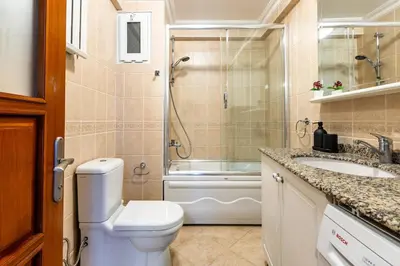 a bathroom with a toilet and a shower and a sink at Gorgeous 3 Bedroom Flat - No8 in Istanbul