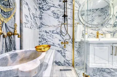 a bathroom with a tub and a sink at Bright Apart Hotel in Istanbul