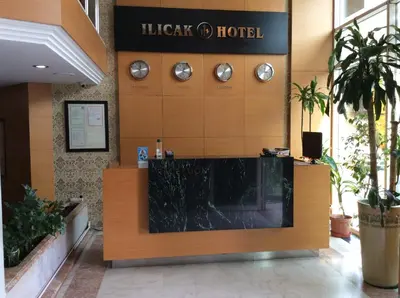 a lobby of a hotel with a large window at Ilıcak Hotel in Istanbul