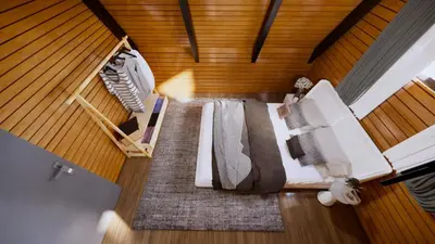 an overhead view of a bed in a room at Redka Bungalov Resort in Ulupelit