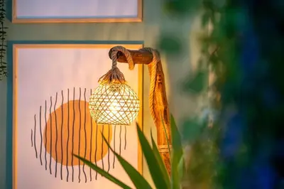 a light hanging from the side of a house at Forest Inspired Designed 1BR Luxury Flat In Tomtom in Istanbul