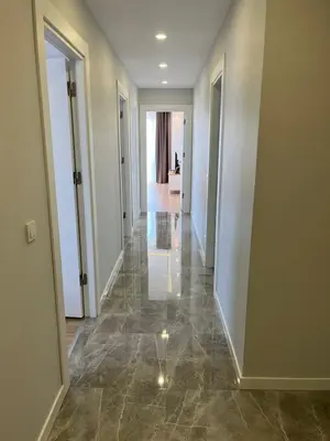 a hallway of a home with a hallway at Istanbul Bostanci Luxury 2 Bedroom Apartment with Pool in Istanbul