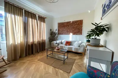 a living room with a couch and a table at cozy 2BR 2BATH with balcony near to nişantaşi and taksim #4 in Istanbul
