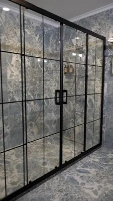 a view of a mountain through a glass window at Hmz Premium Konaklama Çekmeköy in Çekmeköy