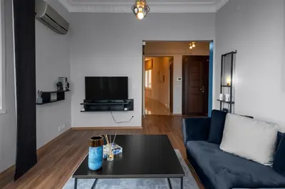a living room with a couch and a coffee table at Elegant 2BR Haven with Magnificent Bosphorus View in Istanbul