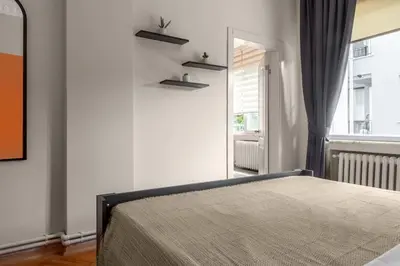 a bedroom with a bed and a window at Fully Equipped & Modern Designed Spectacular 3BR in Istanbul