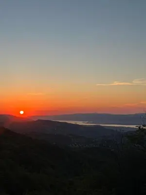 a sunset from the top of a mountain at Kocaeli Başiskele Doğayla İç İçe Özel Havuzlu Tatil Evi in Bahçecik